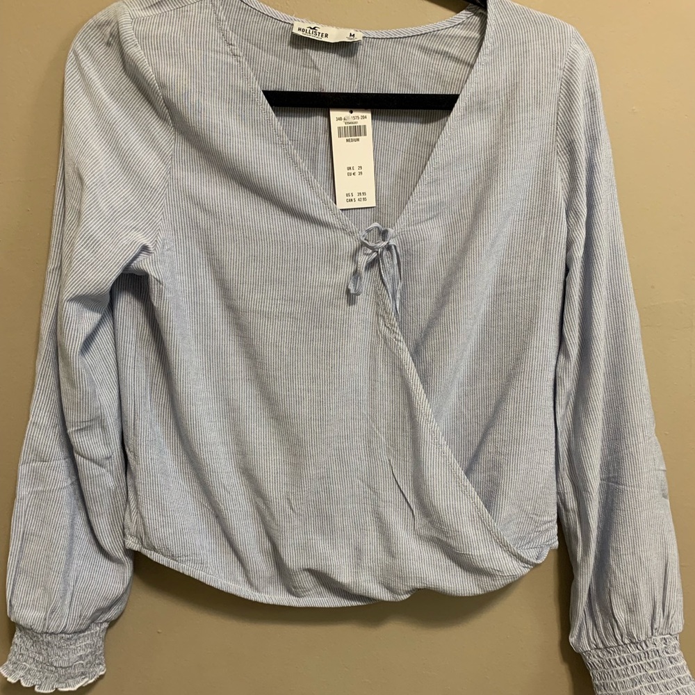 Blue and white striped wrap top